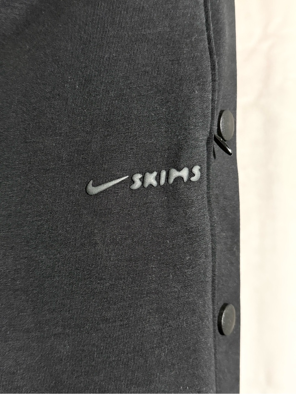 SKIMS Black Snap-Detail Leggings with Nike Swoosh